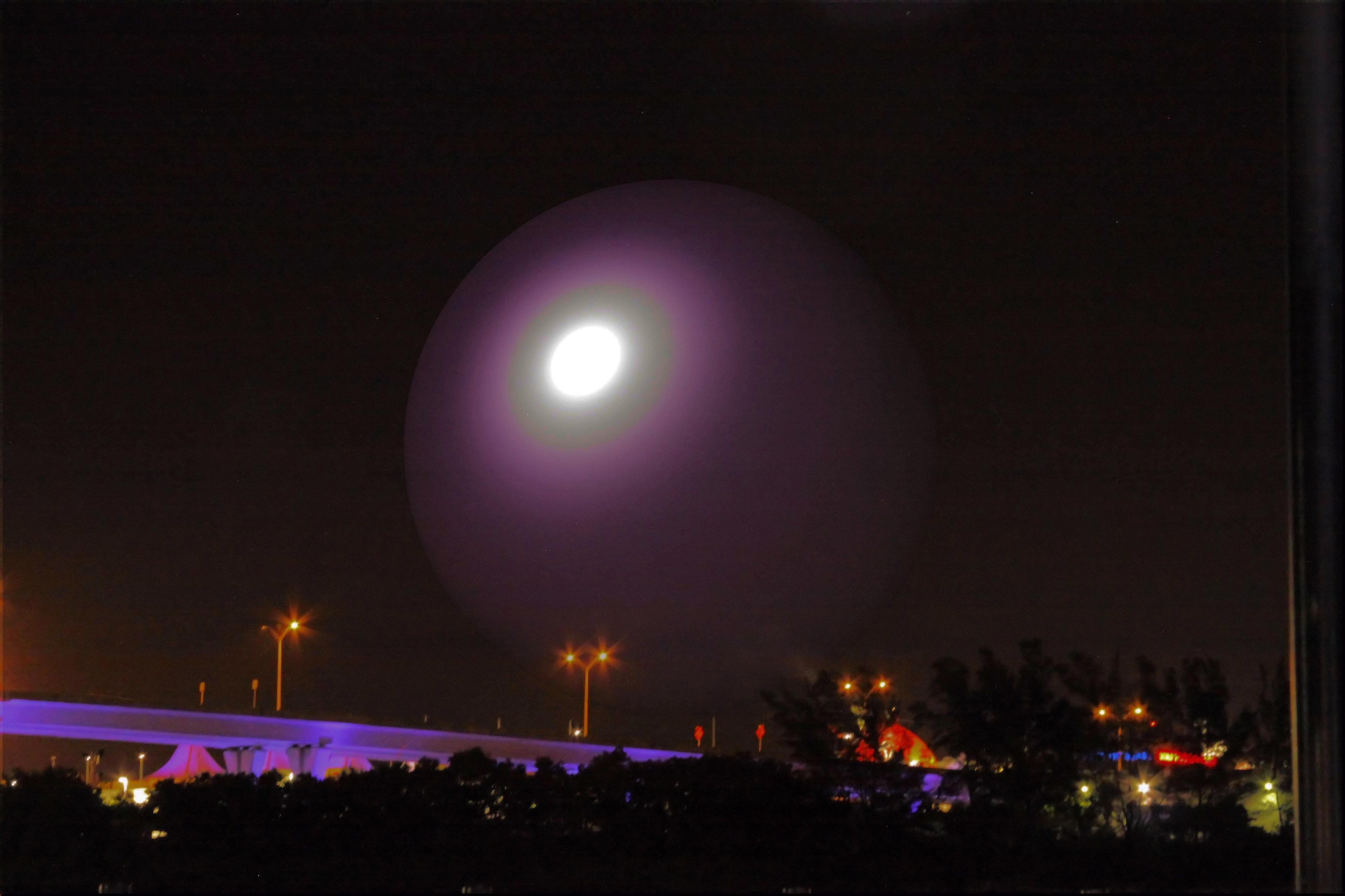 Illuminated sphere installation at night